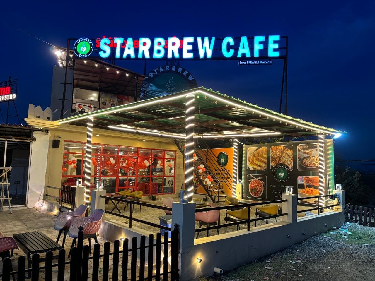 StarBrew Cafe exterior at night